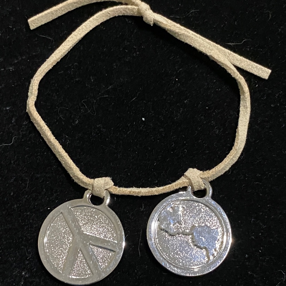 Vintage suede bracelet with two silver environmentalism charms